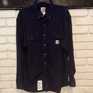 Carhartt New without tags never worn Men longs sleeves Color Navy.